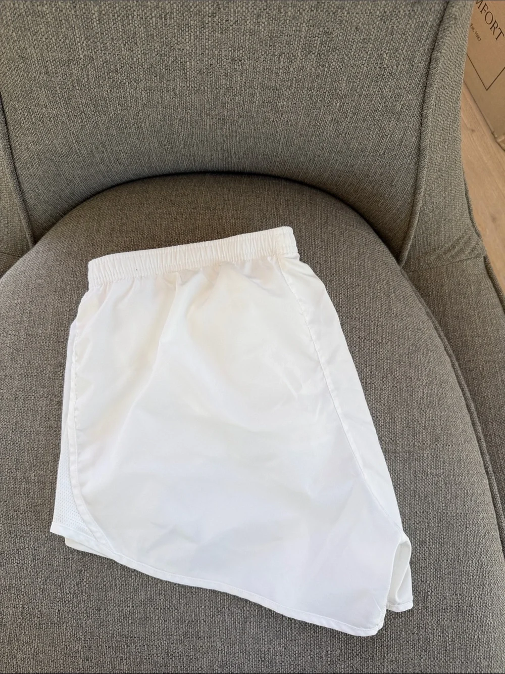 Nike Women’s White Athletic Running Shorts with Silver Swoosh